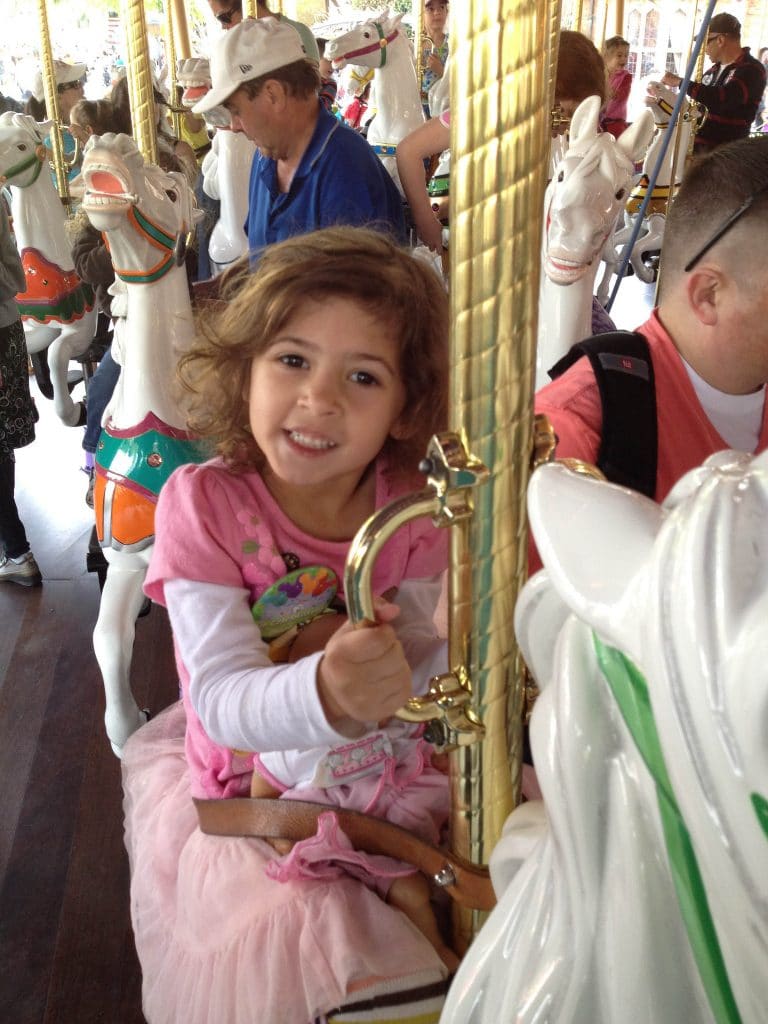 Ainsleigh on a carousel, Source: Flickr